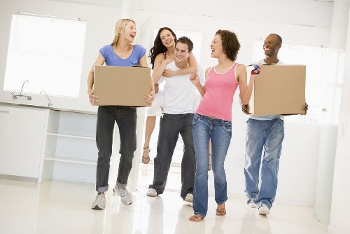 Professional movers handling furniture in Maddington