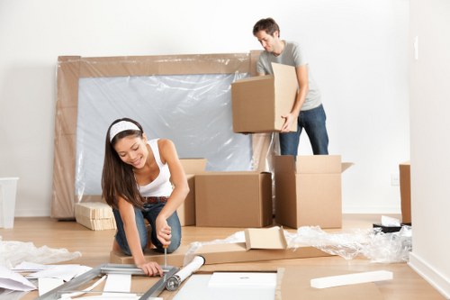 Professional movers handling furniture during a move in Winston Hills