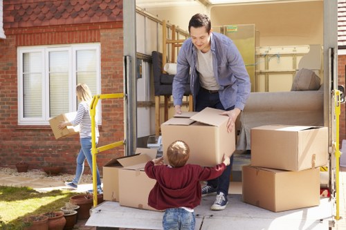 Man with Van Removalists helping a family pack their home