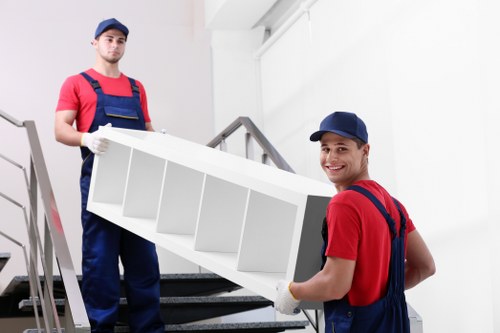 Removalist team packing items securely