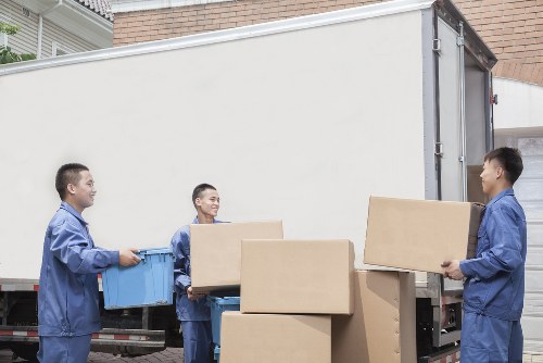 Owen Removalists team handling furniture pick-up