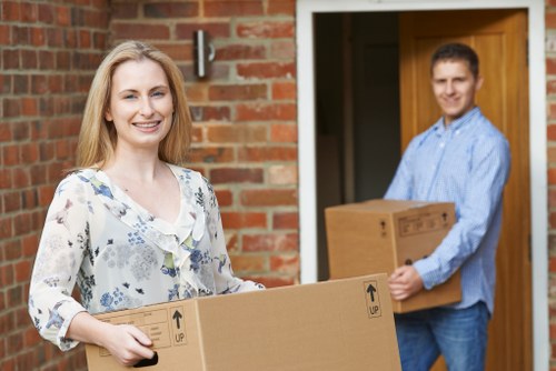 Professional movers loading items into a truck in Dee Why