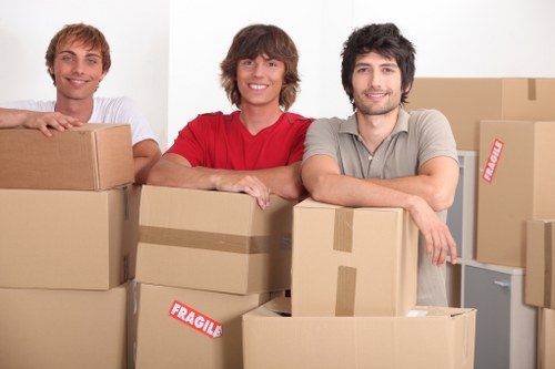 Experienced team packing furniture for a move