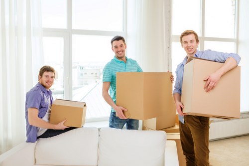 Loading furniture onto a moving truck in Braeside