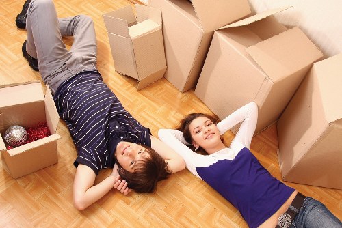 Removalists carefully packing goods for a move