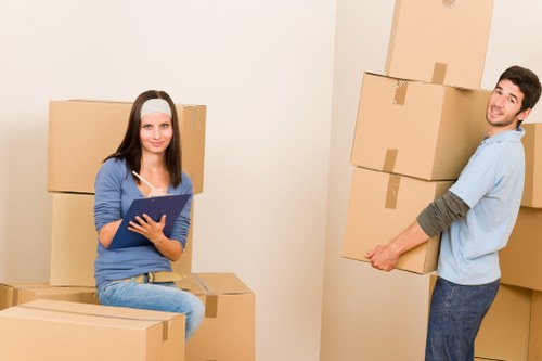 Experienced movers handling furniture with care